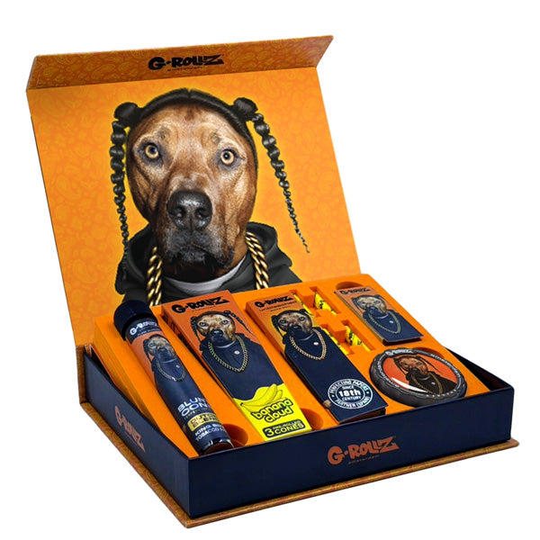 Caja G-Rollz Rap abierta, naranja y negra, con ilustración de perro y accesorios de diseño coordinado