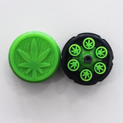 Estuche Revólver negro y verde con seis alojamientos para filtros y tapa con hoja en relieve