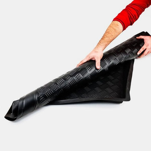 Bandeja Flexi Tray enrollada mostrando su flexibilidad