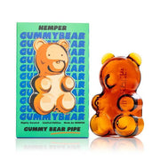 Pipa Hemper Gummy Bear con forma de osito ámbar translúcido junto a su caja verde